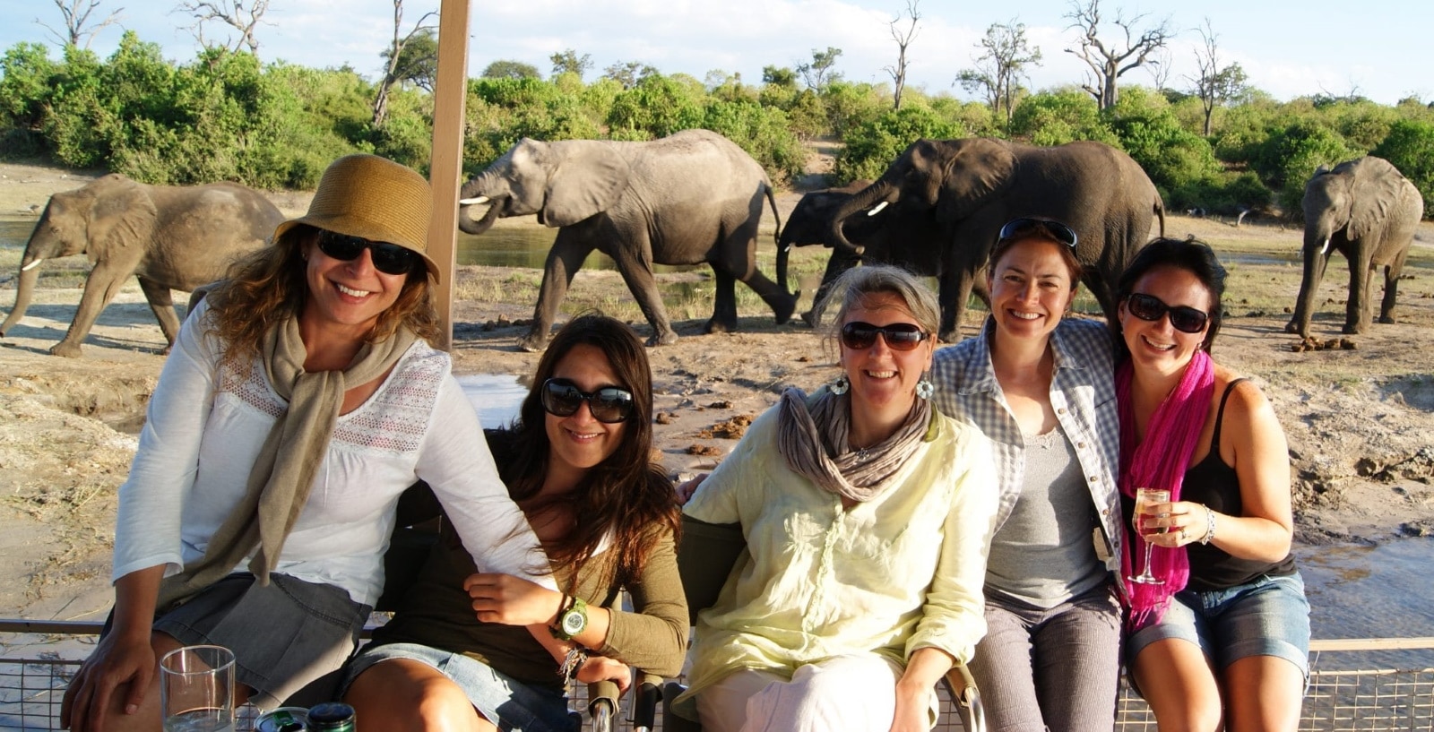 Guests on a Chobe River safari