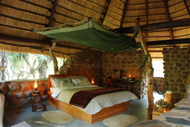 Accommodation at Mkhaya Game Reserve, stone camp