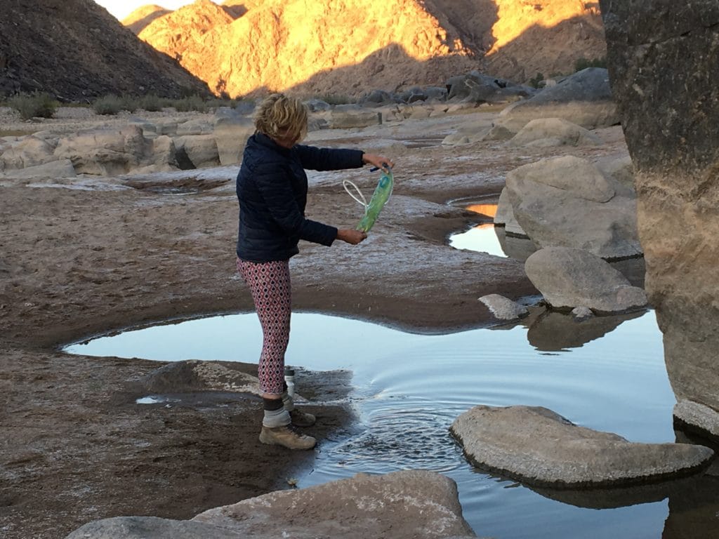 Refilling our bottles - Experiencing the Fish River Canyon